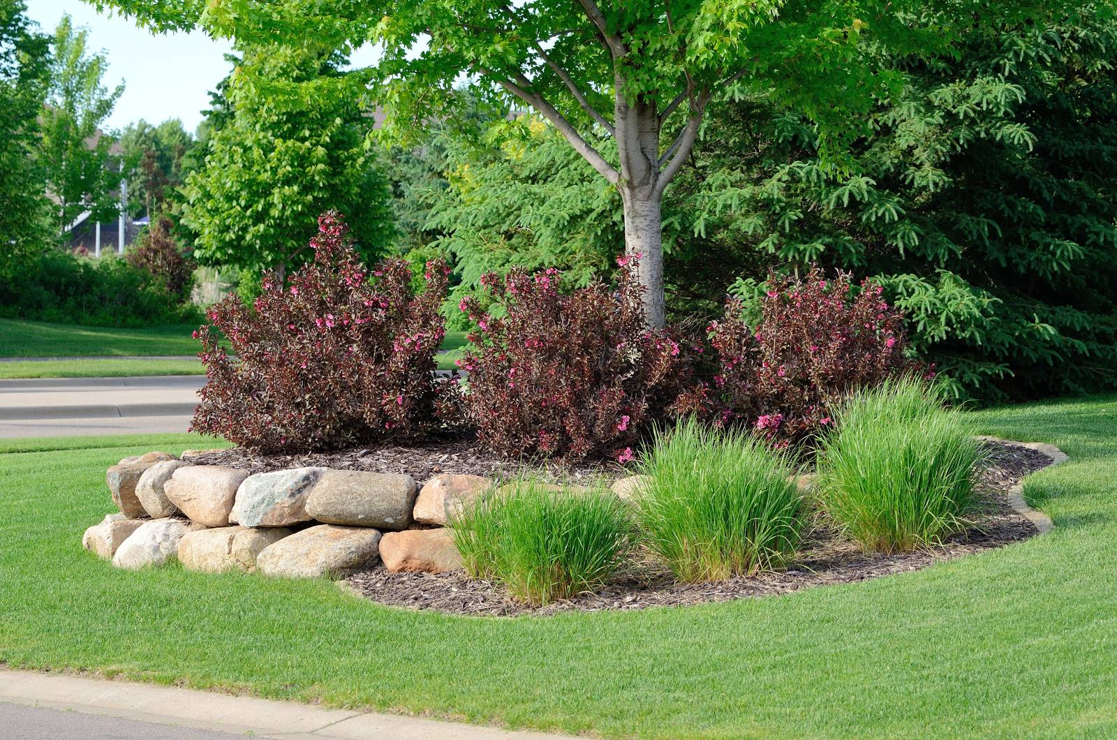 Retaining Wall Installation That Holds Slopes and Adds Flat Yard Space